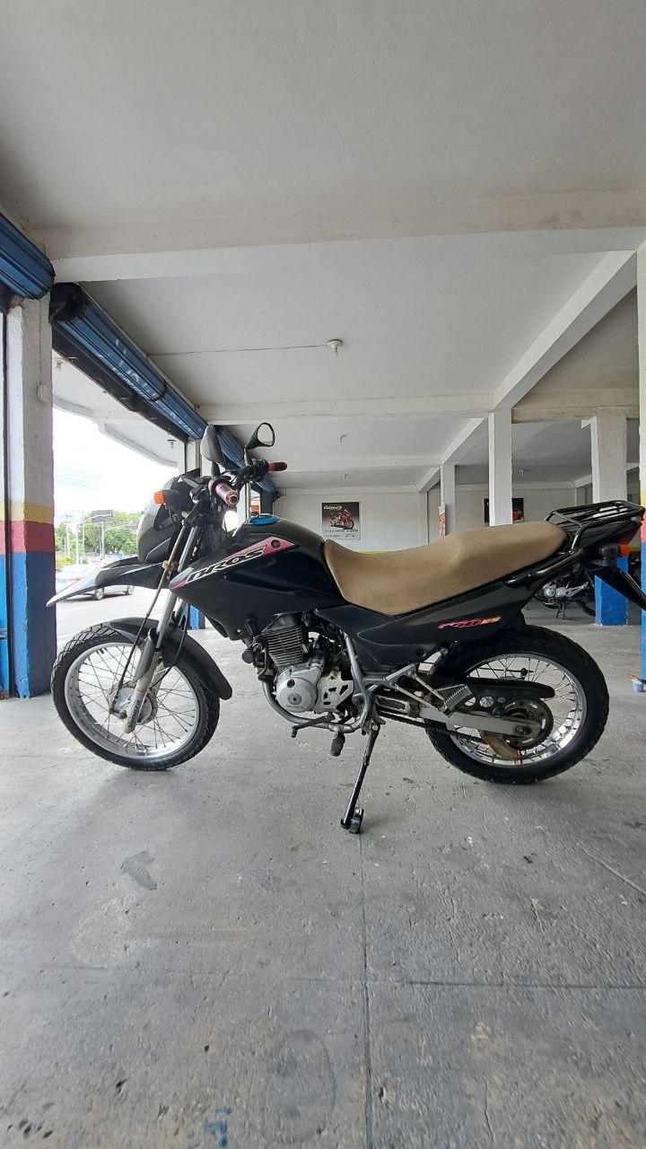 HONDA BROS 150 ES LATERAL ESQUERDA